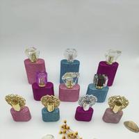 Shiny Glass Perfume Bottle With Unique Cap